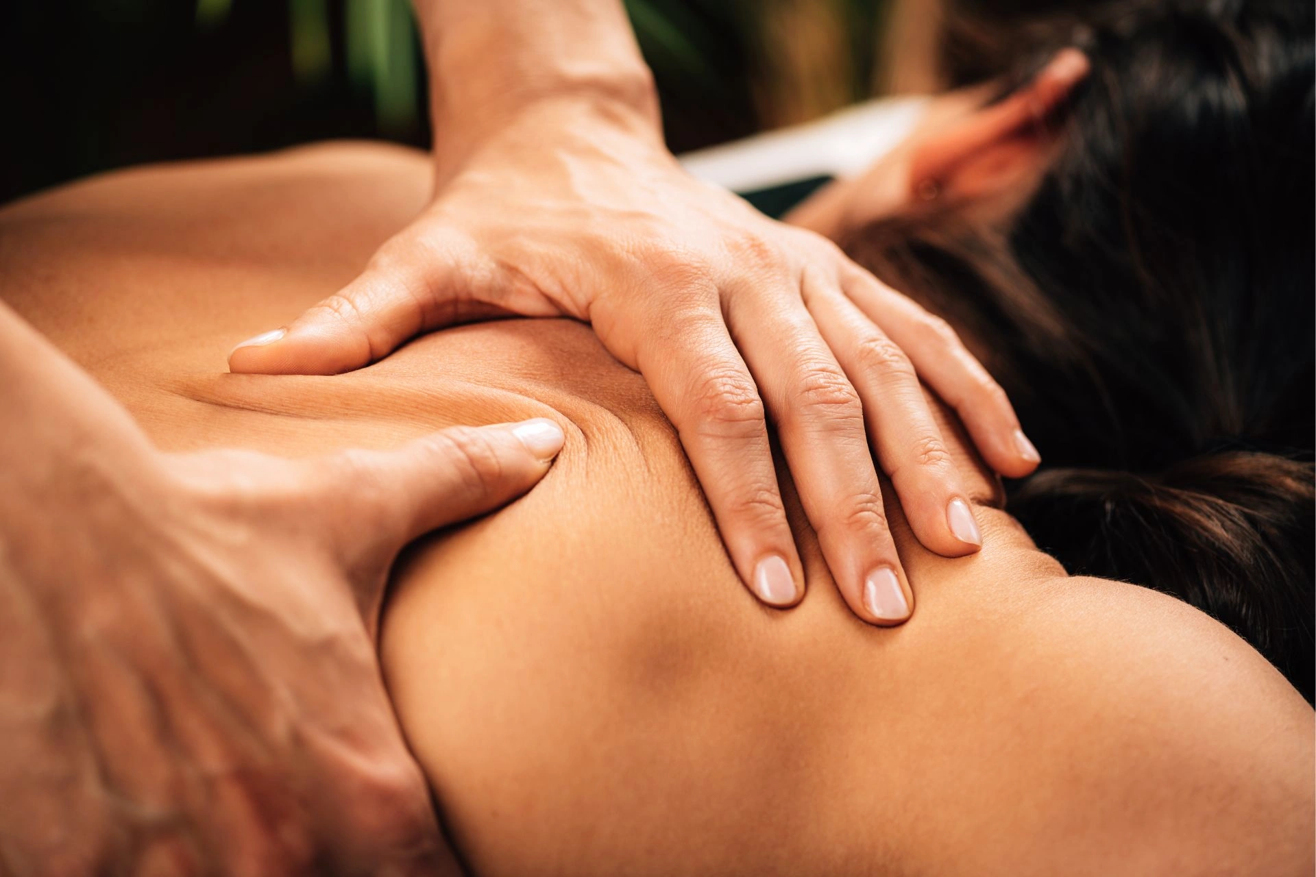 Deep tissue massage on the shoulders
