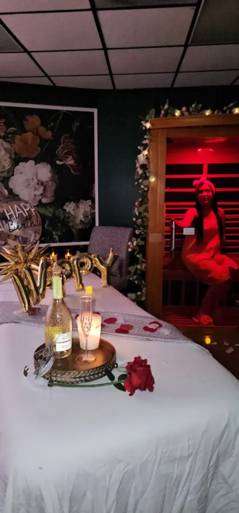 Massage table decorated for a birthday with candles